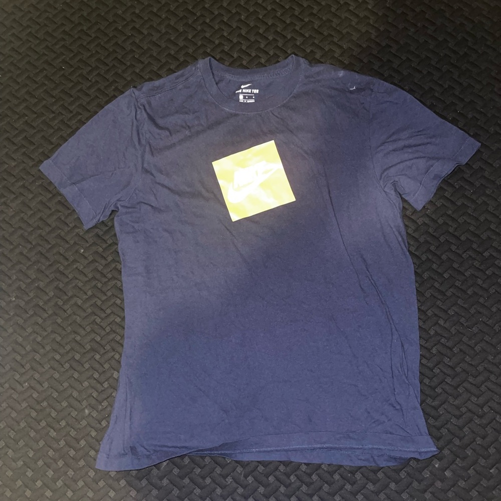 Nike Men's Navy Blue Tee with Yellow Logo